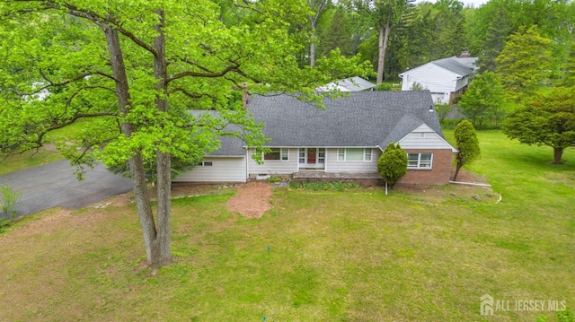 108 Midwood Way, Colonia, NJ 07067 - view of front facade featuring a front lawn and roof with shingles