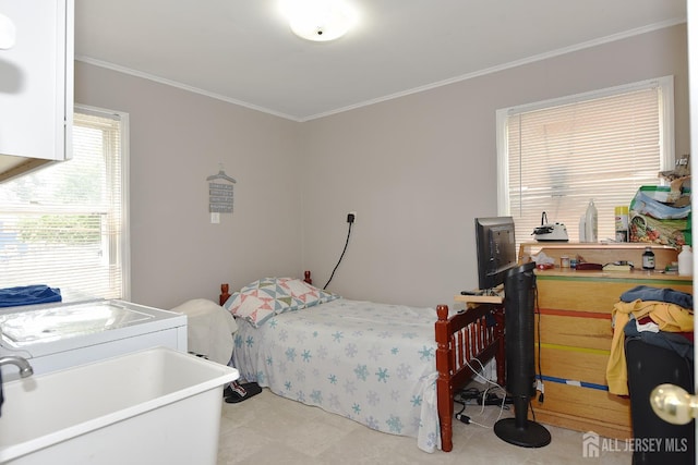 100 Woodland Ave, Fords, NJ 08863 - bedroom with crown molding and washer / dryer