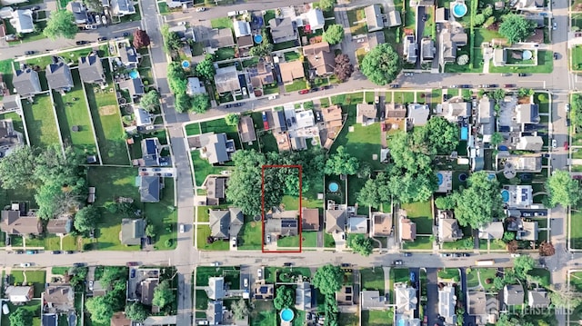 100 Woodland Ave, Fords, NJ 08863 - aerial view of property and surrounding area featuring nearby suburban area and property parcel outlined