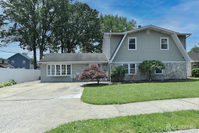 100 Woodland Ave, Fords, NJ 08863 - colonial inspired home featuring driveway, stone siding, and a gambrel roof