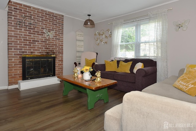 100 Woodland Ave, Fords, NJ 08863 - living area featuring wood finished floors, ornamental molding, and a fireplace
