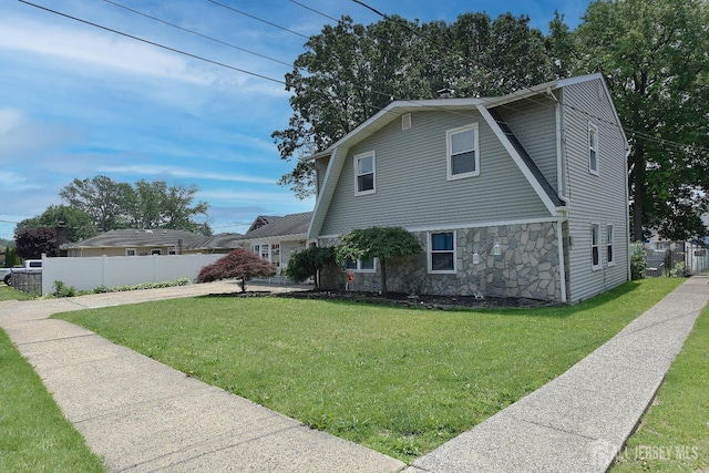 100 Woodland Ave, Fords, NJ 08863 - view of home's exterior featuring stone siding