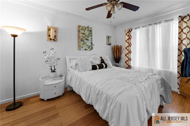 11 Rondell Ln, South Amboy, NJ 08879 - bedroom with light wood-type flooring, crown molding, and ceiling fan