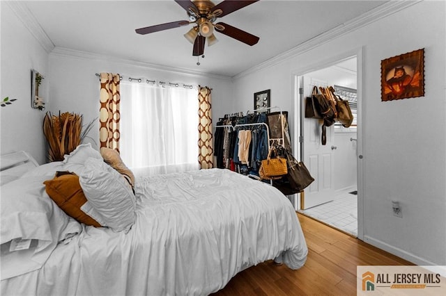 11 Rondell Ln, South Amboy, NJ 08879 - bedroom with wood finished floors, multiple windows, crown molding, and ceiling fan