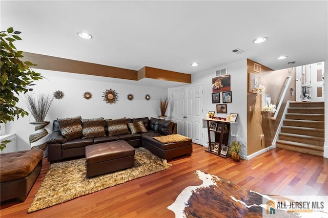 11 Rondell Ln, South Amboy, NJ 08879 - living area with wood finished floors, stairway, and recessed lighting
