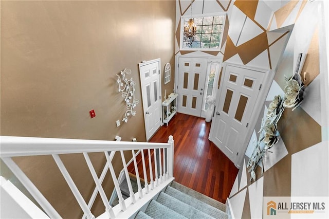11 Rondell Ln, South Amboy, NJ 08879 - entryway featuring a chandelier, wood finished floors, stairway, and a high ceiling