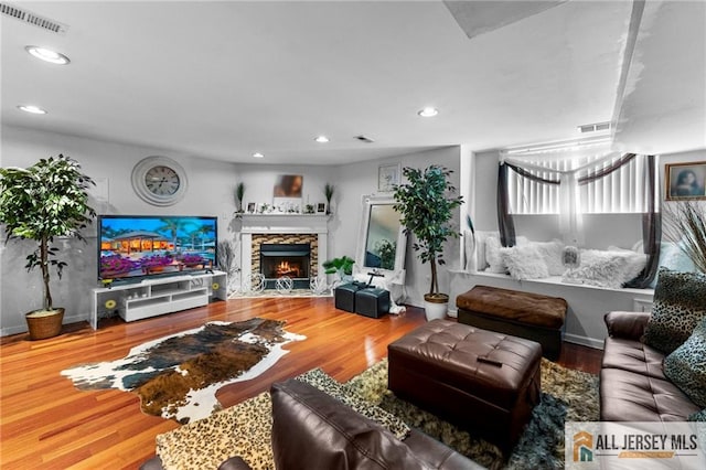 11 Rondell Ln, South Amboy, NJ 08879 - living area with a fireplace, recessed lighting, and wood finished floors