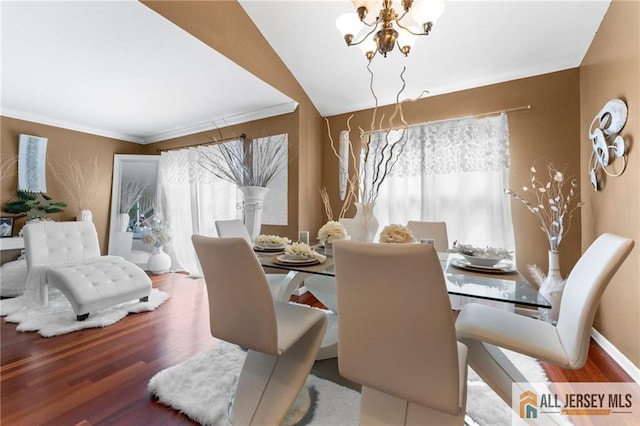 11 Rondell Ln, South Amboy, NJ 08879 - dining room with a chandelier, wood finished floors, ornamental molding, and vaulted ceiling