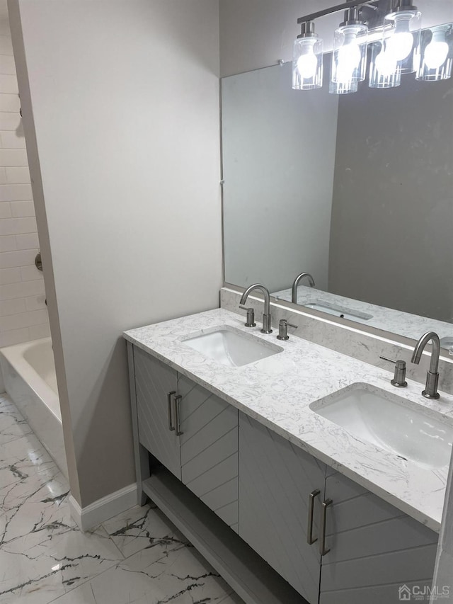 bathroom featuring shower / bathing tub combination and vanity