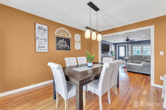 114 Jeffery Rd, Colonia, NJ 07067 - dining area with light wood-style floors, baseboards, and a ceiling fan