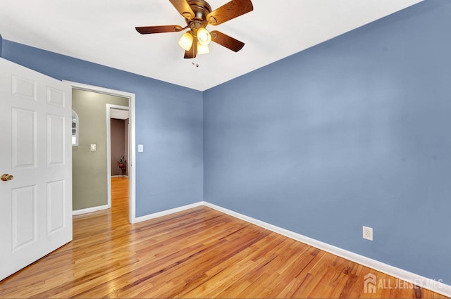 114 Jeffery Rd, Colonia, NJ 07067 - unfurnished bedroom featuring baseboards, light wood-style flooring, and a ceiling fan