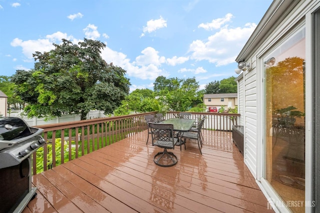 17 4th St, South River, NJ 08882 - wooden terrace with outdoor dining space and grilling area