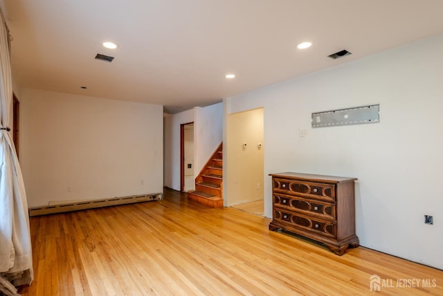 170 Jordon Rd, Colonia, NJ 07067 - spare room with stairway, light wood-type flooring, baseboard heating, and recessed lighting