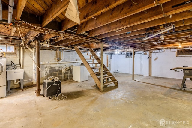 170 Jordon Rd, Colonia, NJ 07067 - unfinished below grade area with washer / clothes dryer, stairway, and a sink