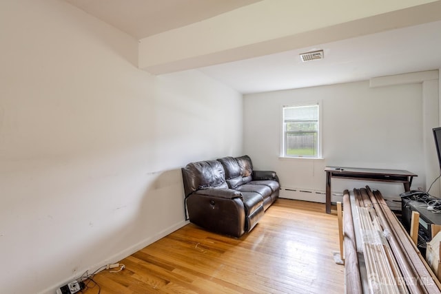 170 Jordon Rd, Colonia, NJ 07067 - living room featuring light wood-style floors, a baseboard radiator, and baseboards