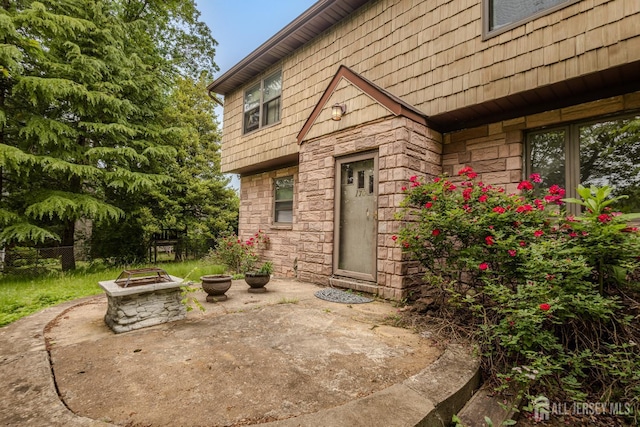 170 Jordon Rd, Colonia, NJ 07067 - property entrance with stone siding and a patio area