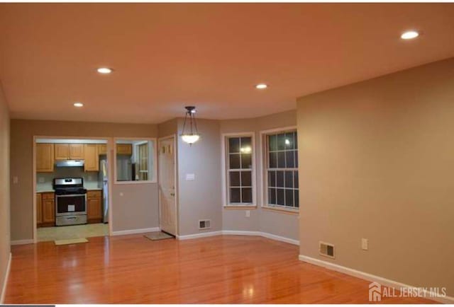 158 Mill Run, Hightstown, NJ 08520 - unfurnished living room with recessed lighting, baseboards, and light wood finished floors
