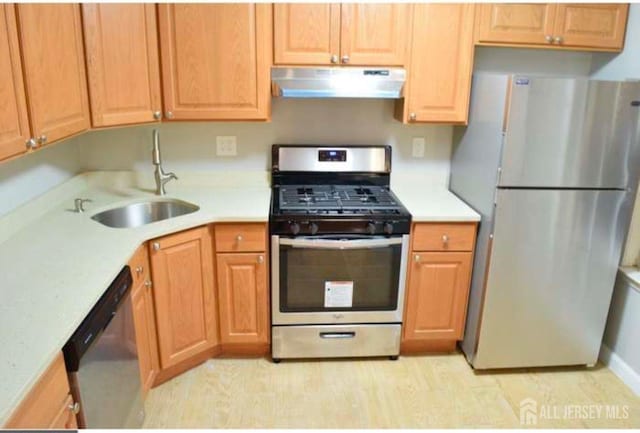 158 Mill Run, Hightstown, NJ 08520 - kitchen featuring stainless steel appliances, under cabinet range hood, light countertops, and a sink