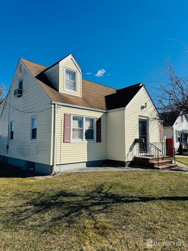 view of front of property with a front lawn