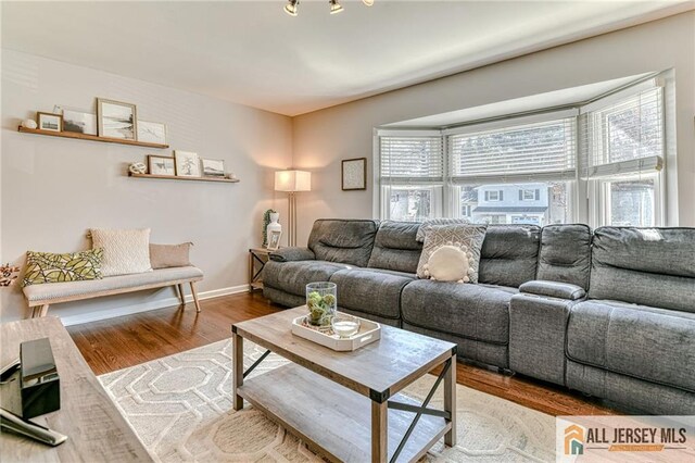 35 Outcalt Rd, Edison, NJ 08817 - living room with baseboards and wood finished floors