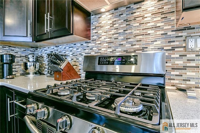 35 Outcalt Rd, Edison, NJ 08817 - kitchen featuring light stone countertops, stainless steel gas range oven, and tasteful backsplash