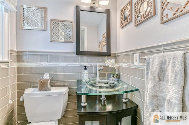 35 Outcalt Rd, Edison, NJ 08817 - bathroom featuring tile walls, a wainscoted wall, and toilet