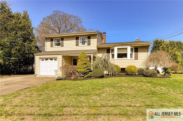 35 Outcalt Rd, Edison, NJ 08817 - split level home with an attached garage, a chimney, driveway, and a front lawn