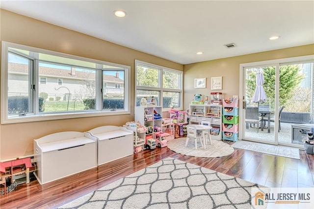 35 Outcalt Rd, Edison, NJ 08817 - recreation room with plenty of natural light, recessed lighting, wood finished floors, and visible vents