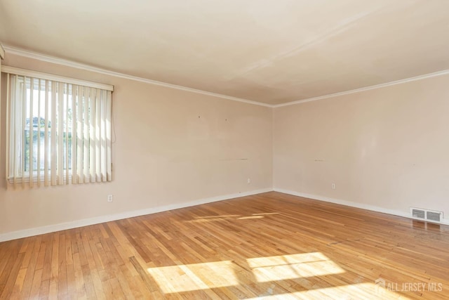 2347 Linden Ave, South Plainfield, NJ 07080 - spare room with light wood-type flooring, baseboards, and ornamental molding