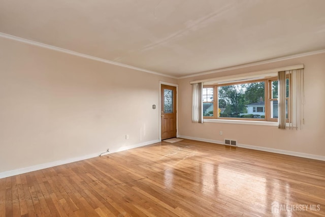 2347 Linden Ave, South Plainfield, NJ 07080 - empty room featuring crown molding, light wood finished floors, and baseboards