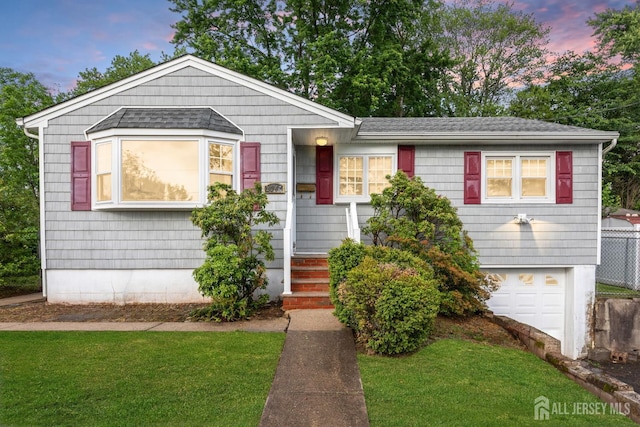 2347 Linden Ave, South Plainfield, NJ 07080 - view of front of house with a garage, a front yard, and roof with shingles