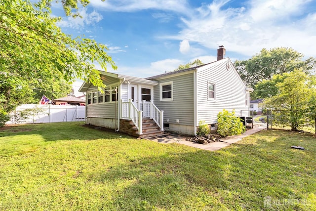 2347 Linden Ave, South Plainfield, NJ 07080 - rear view of house featuring a chimney