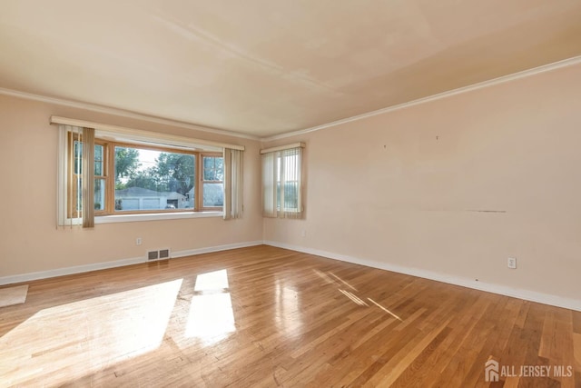 2347 Linden Ave, South Plainfield, NJ 07080 - unfurnished room with crown molding, light wood-type flooring, and baseboards