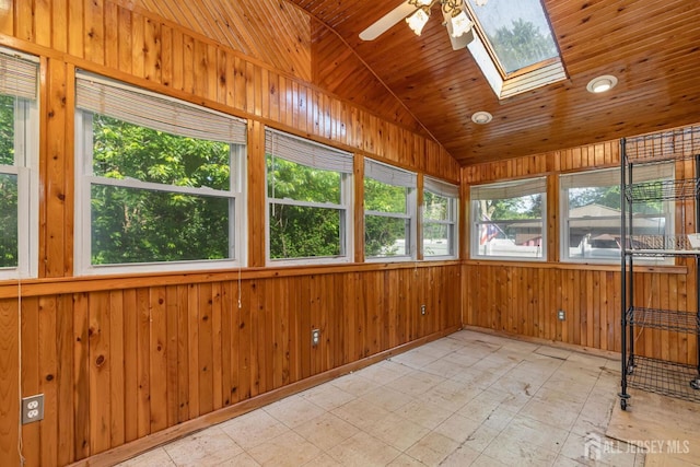 2347 Linden Ave, South Plainfield, NJ 07080 - unfurnished sunroom with a skylight, vaulted ceiling, wooden walls, and tile patterned floors