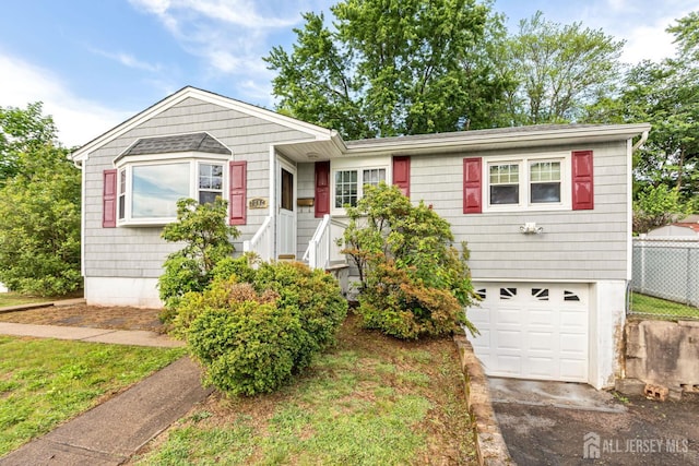 2347 Linden Ave, South Plainfield, NJ 07080 - view of front facade with an attached garage and driveway