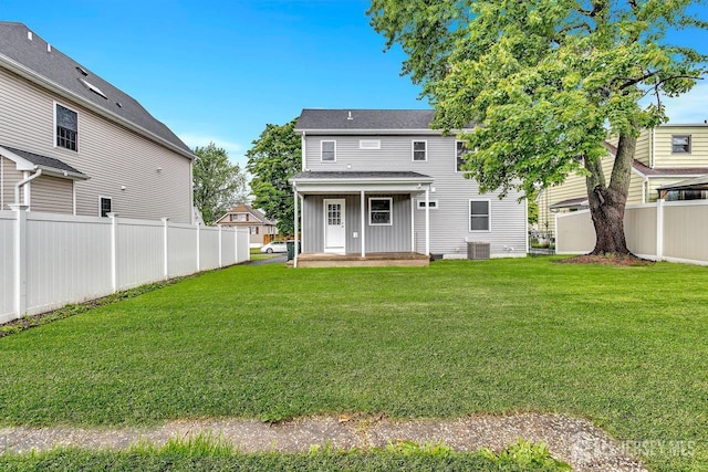 64 2nd Ave, Port Reading, NJ 07064 - rear view of house featuring board and batten siding and roof with shingles