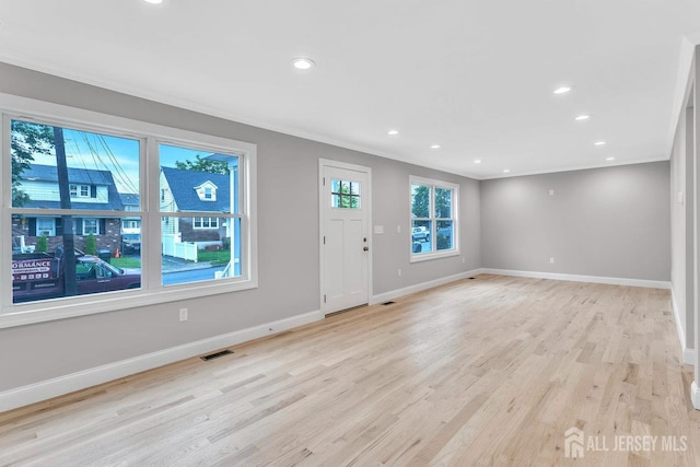64 2nd Ave, Port Reading, NJ 07064 - foyer with baseboards, light wood-style flooring, ornamental molding, and recessed lighting