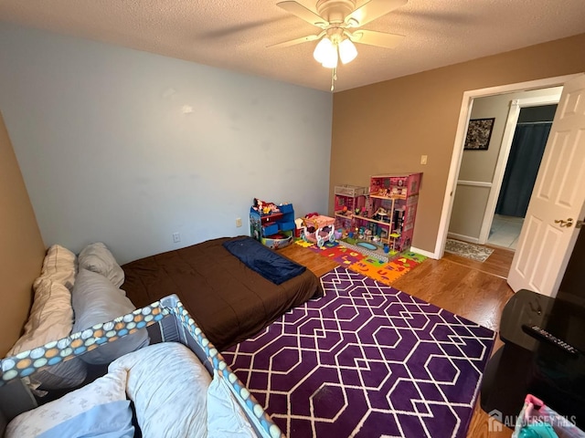 4 Hemlock Hill Rd, Jackson, NJ 08527 - rec room with wood finished floors, ceiling fan, and a textured ceiling