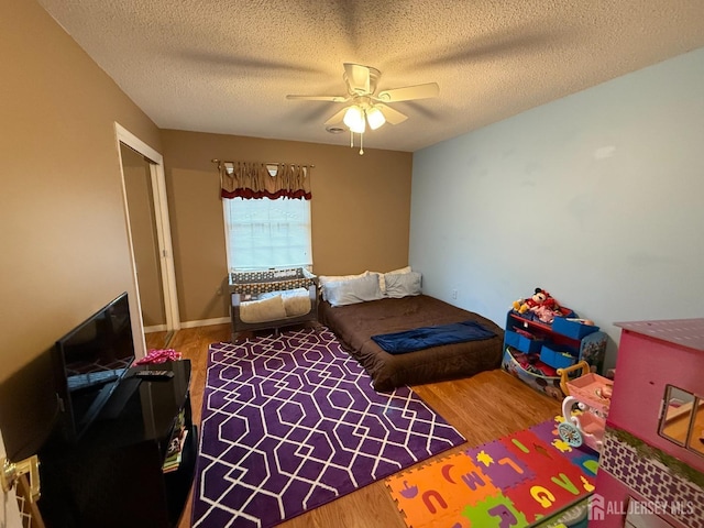 4 Hemlock Hill Rd, Jackson, NJ 08527 - bedroom with wood finished floors, a textured ceiling, ceiling fan, and a closet
