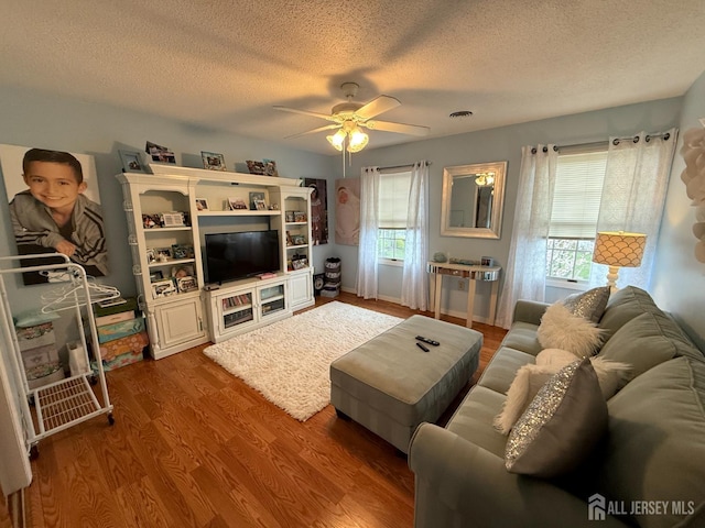 4 Hemlock Hill Rd, Jackson, NJ 08527 - living area with ceiling fan, a textured ceiling, and dark wood-style flooring
