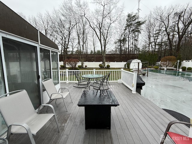 4 Hemlock Hill Rd, Jackson, NJ 08527 - wooden deck featuring a fenced backyard, a shed, an outdoor pool, and outdoor dining area