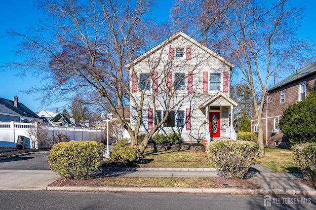 view of front of property with fence