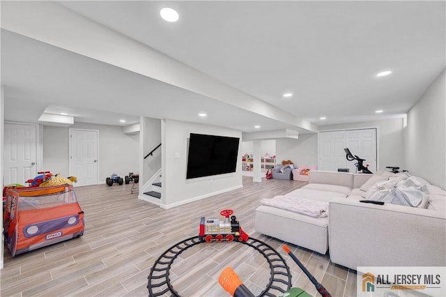 living room with light hardwood / wood-style floors