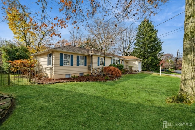 ranch-style home with a front yard