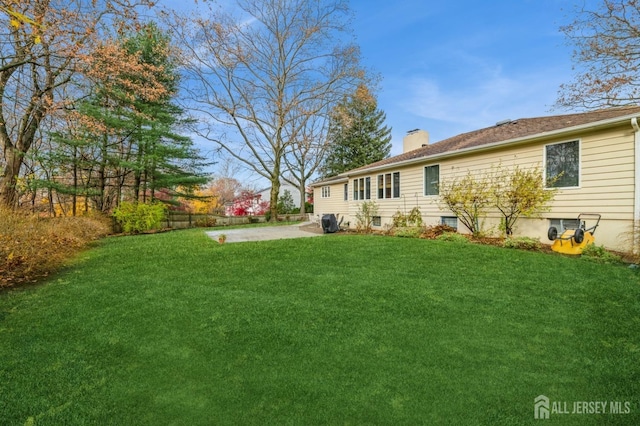 view of yard with a patio area