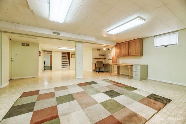 basement with built in desk