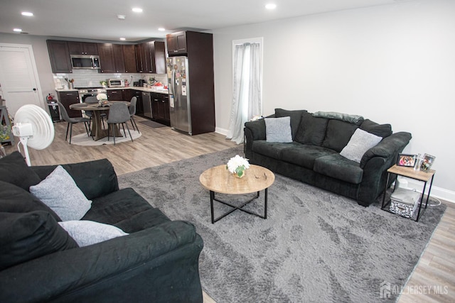 20 Prentice Ave, South River, NJ 08882 - living room featuring light wood-type flooring and recessed lighting