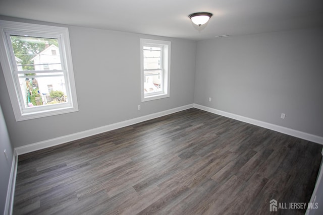 20 Prentice Ave, South River, NJ 08882 - unfurnished room featuring healthy amount of natural light and dark wood finished floors