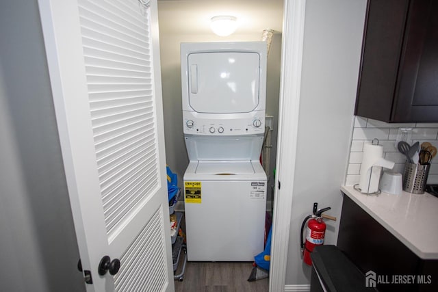 20 Prentice Ave, South River, NJ 08882 - laundry room featuring stacked washer and clothes dryer and wood finished floors