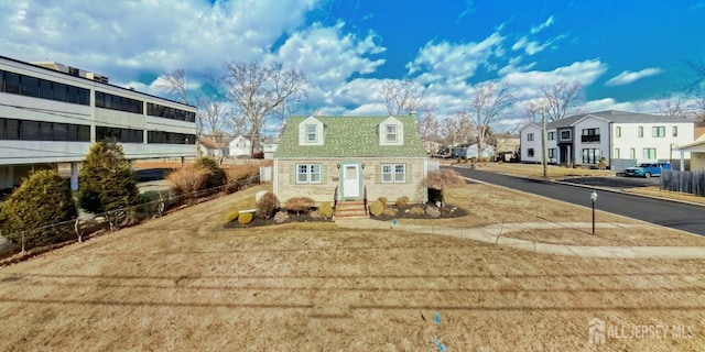 115 Sprague Ave, South Plainfield, NJ 07080 - view of front of house with fence, a residential view, and entry steps